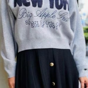 Falda punto nera corta